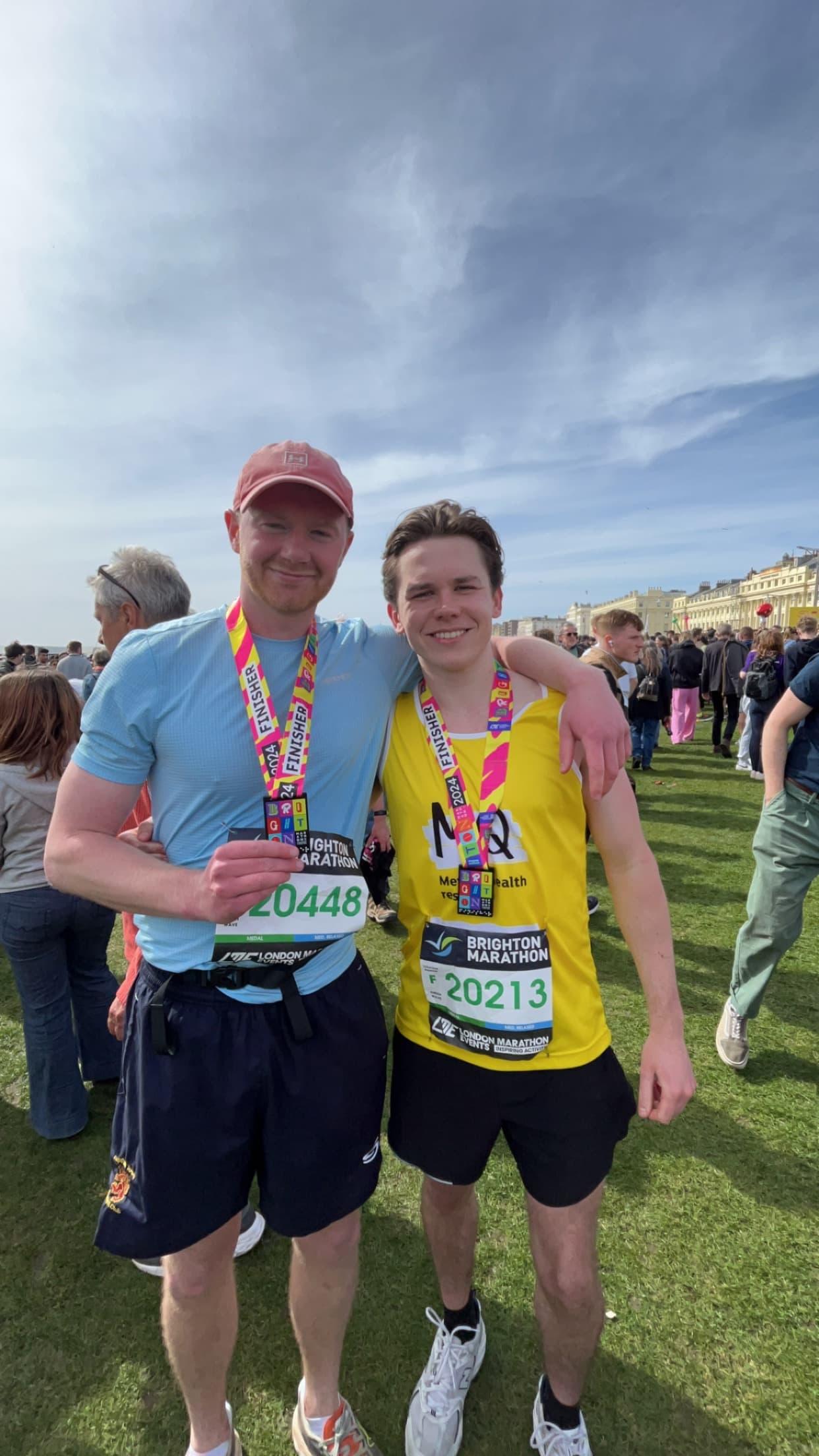 Alex with a medal after finishing the Brighton Marathon.
