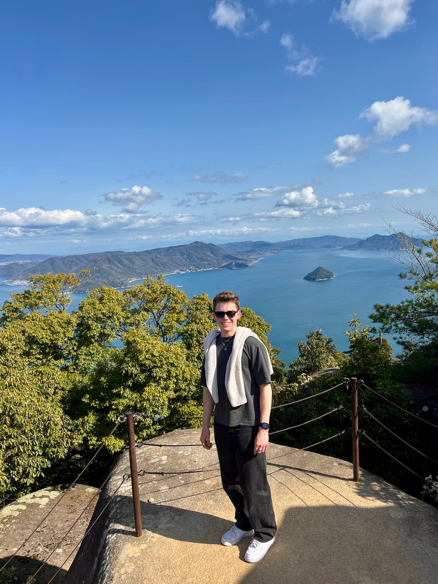 Alex with coastline and islands in Japan.